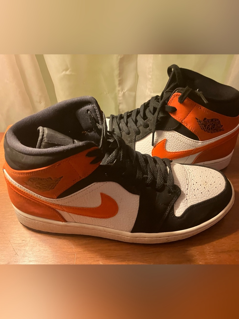 Nike Air Jordan high top sneakers in orange white and black size 10